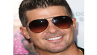 The Crazy Reason Robin Thicke Wouldn't Pose Solo In Photos