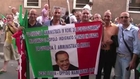 Berlusconi seeks to ease fears on coalition future